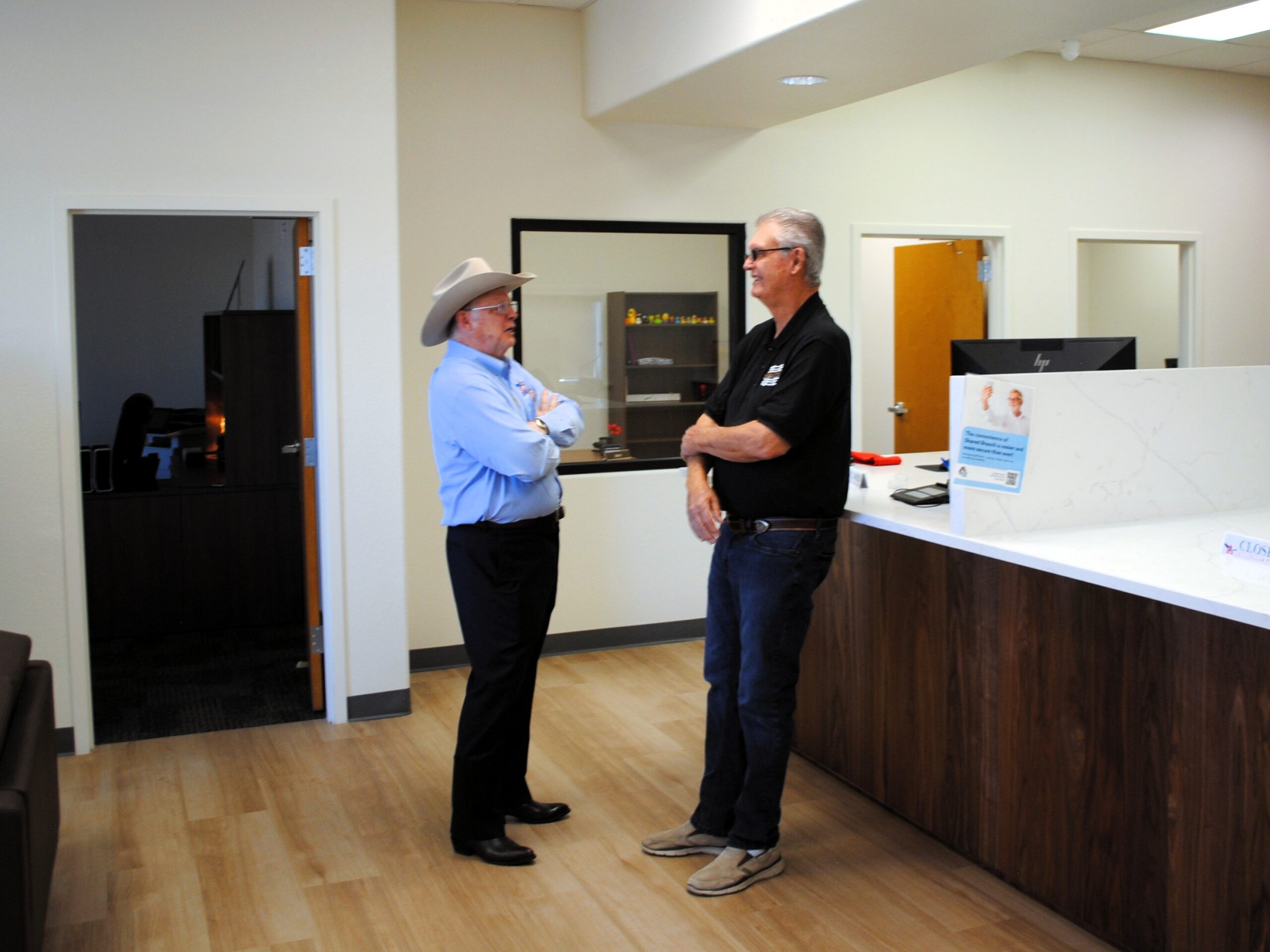 ASCU and Benson Chamber representatives inside the branch