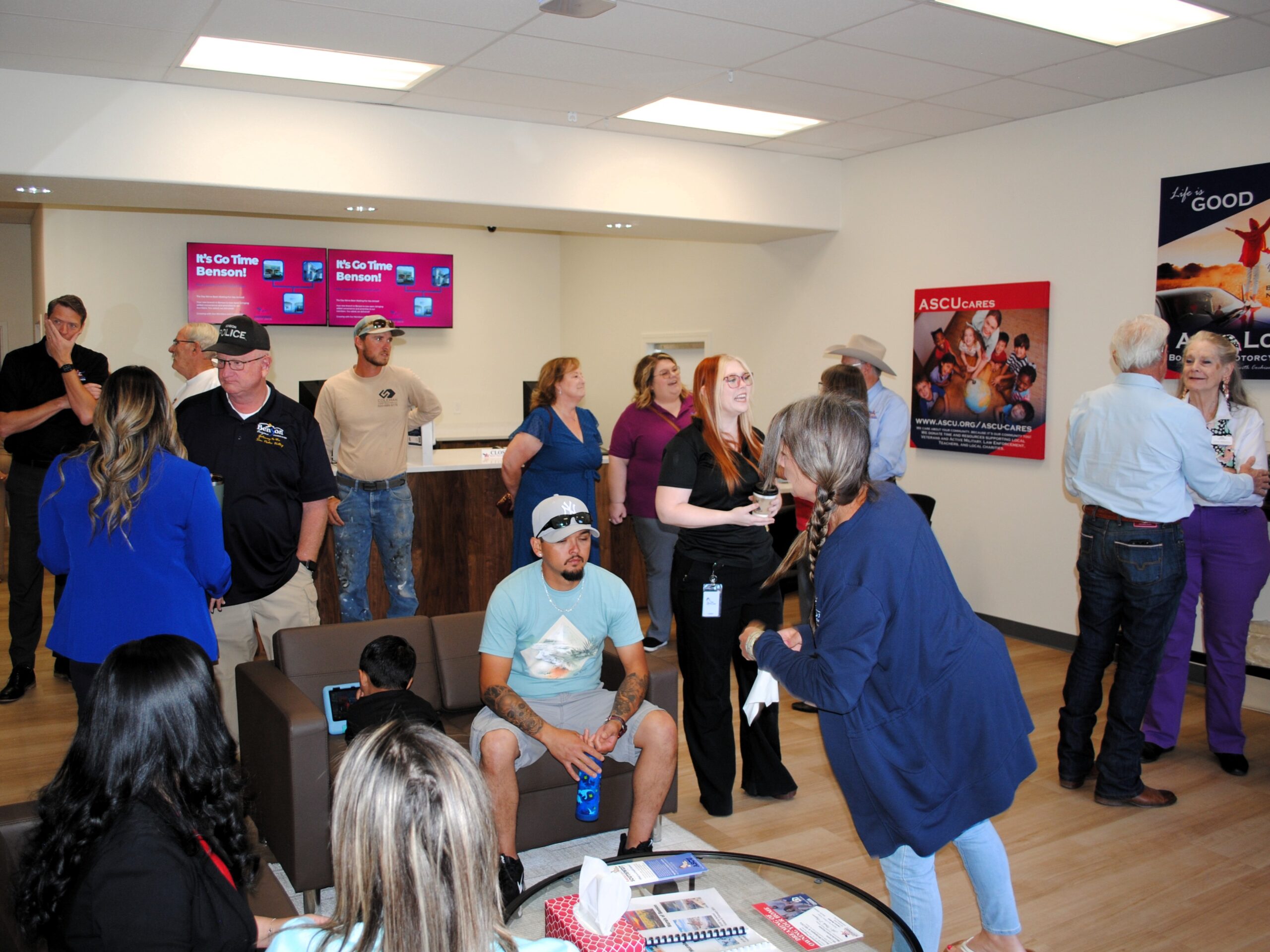 Community members gathered inside the new branch lobby